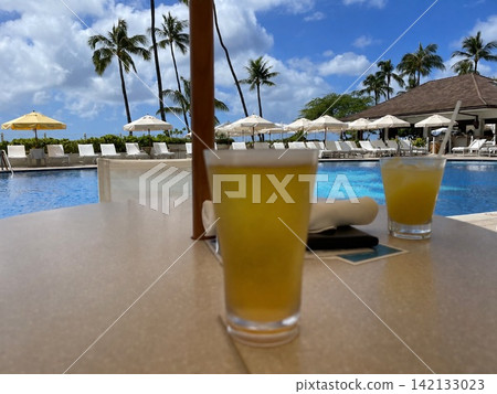 The pool side of the resort The pool side of the resort 142133023