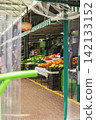 Fresh Fruits and Vegetables at Local Farmers Market Stall seen through transparent curtains. Organic tomatoes, oranges, lettuce, seasonal produce. Colorful food market, healthy eating, local produce 142133152