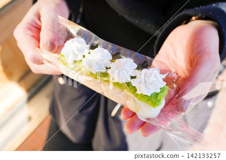 A sweet treat featuring Sendai's famous Zunda mochi topped with whipped cream. A sweet treat featuring Sendai's famous Zunda mochi topped with whipped cream. 142133257
