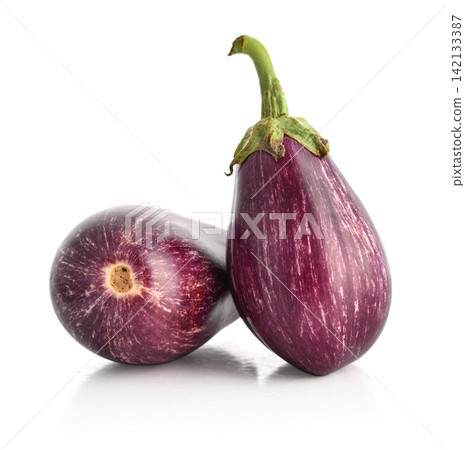 Fresh purple eggplant isolated on a white background Fresh purple eggplant isolated on a white background 142133387