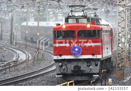 Sleeper express Cassiopeia running in the rain Sleeper express Cassiopeia running in the rain 142133557