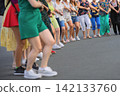 Women Dancing Street Circle Horo, Public Event in Bulgaria. Traditional horo dance, public outdoor gathering. Group of participants holding hands. Bulgarian folk dance 142133760