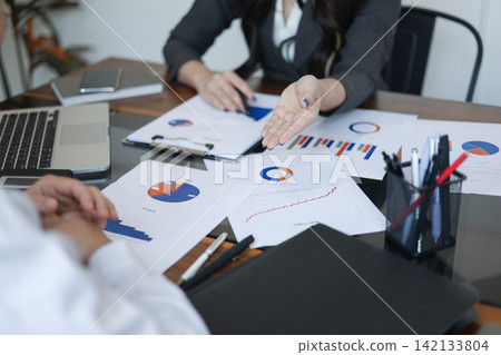 Business people meeting for brainstorming, discussing and analyzing data Business people meeting for brainstorming, discussing and analyzing data 142133804
