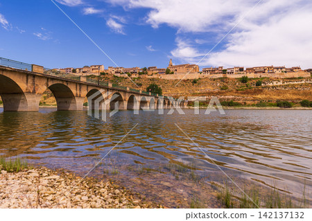 View of Maderuelo town village from opposite bank of river or reservoir View of Maderuelo town village from opposite bank of river or reservoir 142137132