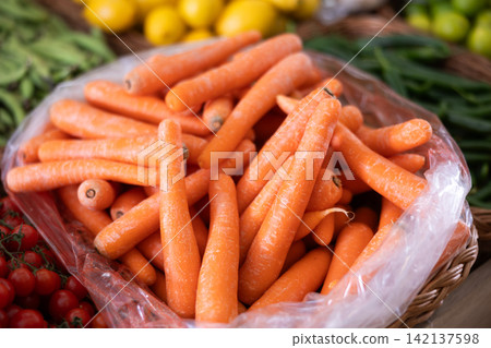 Carrots in shop window. Carrots in shop window. 142137598
