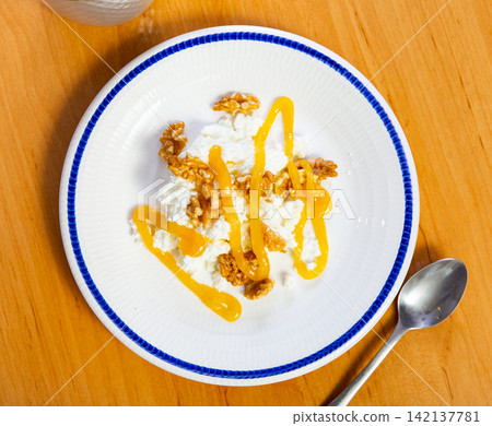 Mato cheese with honey and walnuts Mato cheese with honey and walnuts 142137781