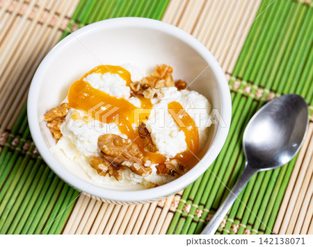 Mato cheese with honey and walnuts Mato cheese with honey and walnuts 142138071