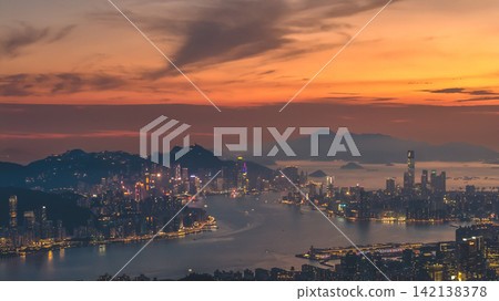 Hong Kong Aug 5 2026 Victoria Harbour skyline during vibrant dusk sunset 142138378