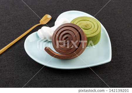 green Matcha and Chocolate Flavored Chewy Roll Candy green Matcha and Chocolate Flavored Chewy Roll Candy 142139201