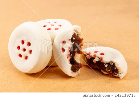 traditional Chinese Date Filled Pastry Cake with White Crust traditional Chinese Date Filled Pastry Cake with White Crust 142139713