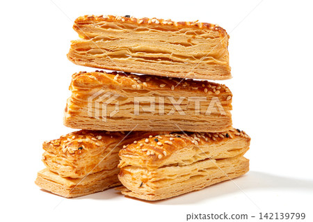 savory Layered Puff Pastry Snack with Crispy Texture savory Layered Puff Pastry Snack with Crispy Texture 142139799