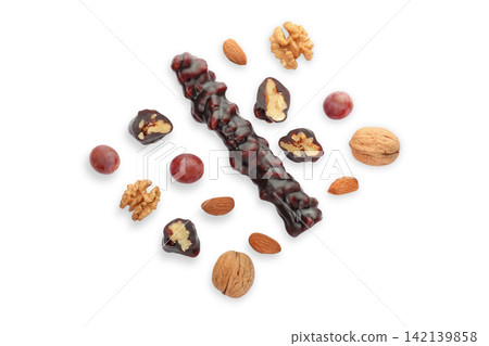 Colorful arrangement of Churchkhela surrounded by nuts and dried fruits, PNG Colorful arrangement of Churchkhela surrounded by nuts and dried fruits, PNG 142139858