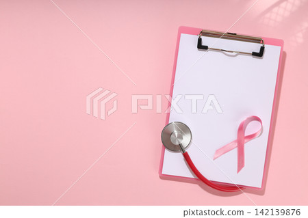 Pink clipboard with blank sheet and stethoscope Pink clipboard with blank sheet and stethoscope 142139876