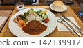 Everyone's favorite hamburger lunch, served with bread. 142139912