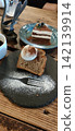 Chiffon cake and coffee at a stylish cafe. 142139914