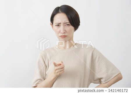 Female middle-aged complainer white background Female middle-aged complainer white background 142140172