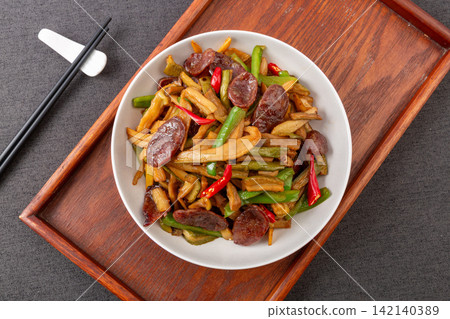 chinese Sausage Stir Fry With Preserved Radish Vegetable chinese Sausage Stir Fry With Preserved Radish Vegetable 142140389