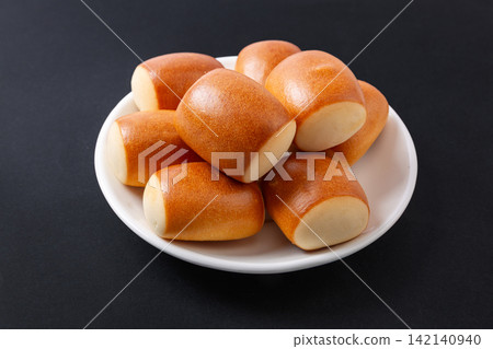 small Pretzel Style Bread Rolls Isolated On White Background small Pretzel Style Bread Rolls Isolated On White Background 142140940