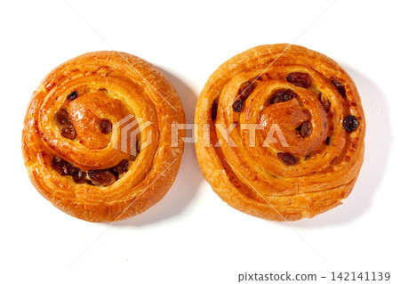 freshly Baked Cinnamon Raisin Danish Pastry Roll Isolated On White Background freshly Baked Cinnamon Raisin Danish Pastry Roll Isolated On White Background 142141139