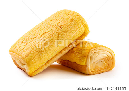 soft Custard Cream Swiss Rolls Served On Green Ceramic Plate soft Custard Cream Swiss Rolls Served On Green Ceramic Plate 142141165