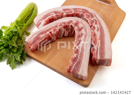 raw Pork Belly with Rib Bones and Celery 142141427