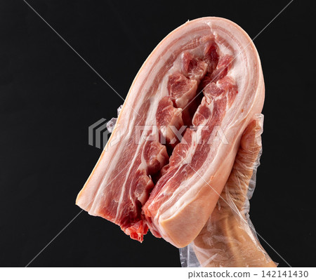 raw Pork Belly with Rib Bones and Celery raw Pork Belly with Rib Bones and Celery 142141430