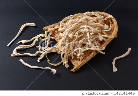 dried Radish Strips Cut in Woven Basket dried Radish Strips Cut in Woven Basket 142141449