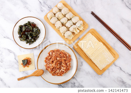 handmade Wonton Making Ingredients with Century Egg and Minced Pork handmade Wonton Making Ingredients with Century Egg and Minced Pork 142141473