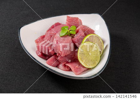 diced Raw Lean Pork Shoulder Meat on Plate diced Raw Lean Pork Shoulder Meat on Plate 142141546
