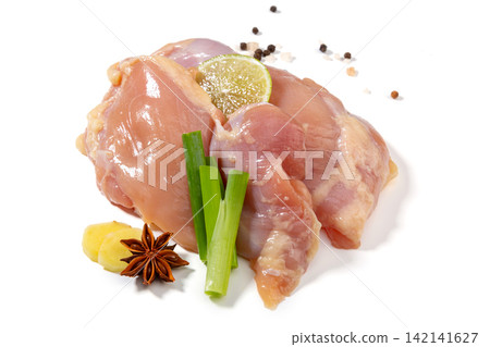 boneless Skinless Raw Chicken Thigh Meat with Lime boneless Skinless Raw Chicken Thigh Meat with Lime 142141627