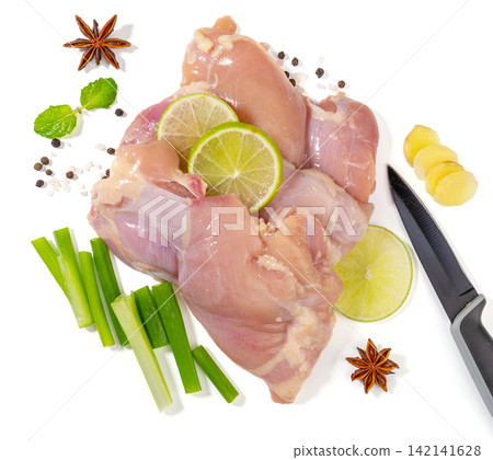 boneless Skinless Raw Chicken Thigh Meat with Lime boneless Skinless Raw Chicken Thigh Meat with Lime 142141628