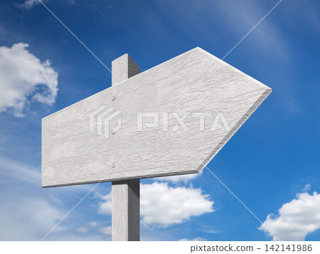 A close-up of the blue sky and a signpost. A close-up of the blue sky and a signpost. 142141986