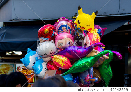 Colorful Cartoon Balloons on Dihua Street, Taipei Colorful Cartoon Balloons on Dihua Street, Taipei 142142899