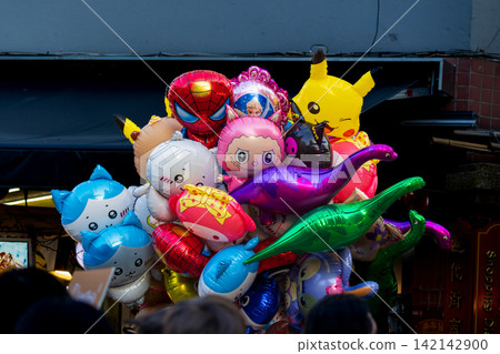 Colorful Cartoon Balloons on Dihua Street, Taipei Colorful Cartoon Balloons on Dihua Street, Taipei 142142900