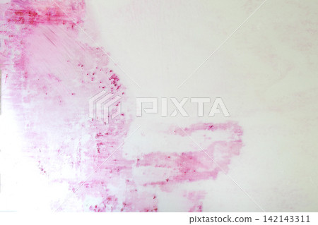 Abstract background of vibrant red liquid ink and droplets spreading on a light pink surface, creating a marbled texture. Halloween concept Abstract background of vibrant red liquid ink and droplets spreading on a light pink surface, creating a marbled texture. Halloween concept 142143311