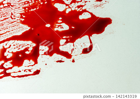 Red blood splatter and smears on a white surface, suitable for horror, crime scene, or forensic concepts. Halloween concept Red blood splatter and smears on a white surface, suitable for horror, crime scene, or forensic concepts. Halloween concept 142143319