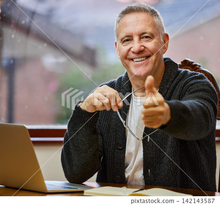 Portrait, senior man and laptop with thumbs up for remote work, agreement and schedule planning. Mature male therapist, home and emoji for yes with online counseling, telehealth and home on internet Portrait, senior man and laptop with thumbs up for remote work, agreement and schedule planning. Mature male therapist, home and emoji for yes with online counseling, telehealth and home on internet 142143587