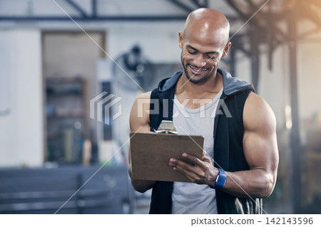 Man, clipboard and sports coach in gym with writing notes for client appointment, strong body and fitness. Personal trainer person, paperwork and admin in wellness club for business and training job Man, clipboard and sports coach in gym with writing notes for client appointment, strong body and fitness. Personal trainer person, paperwork and admin in wellness club for business and training job 142143596