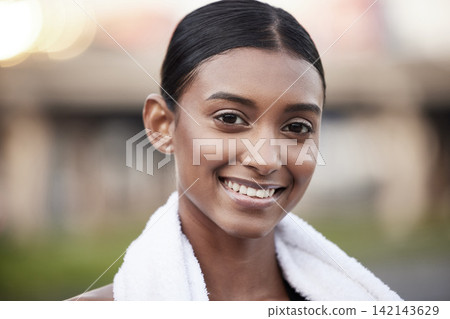 Portrait, woman and fitness with towel outdoor for exercise break, strong body and wellness. Indian female athlete, happy and rest with cloth in park for marathon training, workout and nature running Portrait, woman and fitness with towel outdoor for exercise break, strong body and wellness. Indian female athlete, happy and rest with cloth in park for marathon training, workout and nature running 142143629