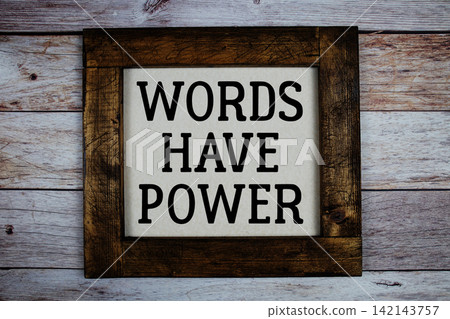 Words Have Power text written on wooden frame top view on wooden background Words Have Power text written on wooden frame top view on wooden background 142143757