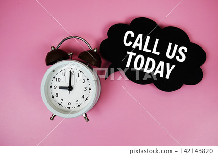 Call Us Today text on speech bubble with alarm clock on pink background Call Us Today text on speech bubble with alarm clock on pink background 142143820