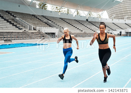 Race track, power and women running at stadium with energy, speed and resilience training, Arena, race or marathon competition with competitive athlete runner outdoor for fitness, freedom or sprint Race track, power and women running at stadium with energy, speed and resilience training, Arena, race or marathon competition with competitive athlete runner outdoor for fitness, freedom or sprint 142143871