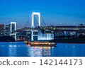 Rainbow bridge at night and houseboat 142144173
