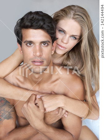 Couple, relax and portrait in bed embrace, morning and romance bonding in home for relationship. People, hug and security in marriage connection, care and together in hotel on vacation or holiday Couple, relax and portrait in bed embrace, morning and romance bonding in home for relationship. People, hug and security in marriage connection, care and together in hotel on vacation or holiday 142144494
