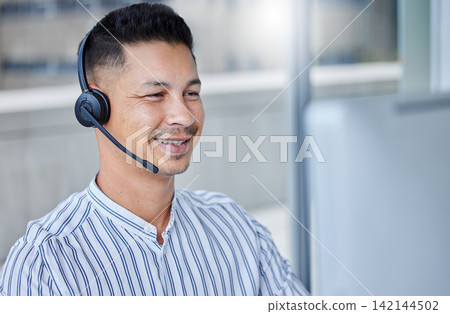 Man, telemarketing and headset at computer or call centre for technical support, solution or crm. Male person, face and smile for customer service at help desk as it advisor, consultation or contact Man, telemarketing and headset at computer or call centre for technical support, solution or crm. Male person, face and smile for customer service at help desk as it advisor, consultation or contact 142144502