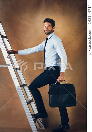 Male person, climbing and corporate ladder in studio for work opportunity, promotion and high salary. Confident, man and entrepreneur with suitcase for trip to skill, responsibility and goals Male person, climbing and corporate ladder in studio for work opportunity, promotion and high salary. Confident, man and entrepreneur with suitcase for trip to skill, responsibility and goals 142144714