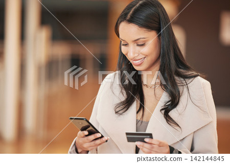 Woman, smartphone and credit card for online shopping, smile and love for retail boutique. Customer, ecommerce and purchase for gift, sale and discount with fashio, store present and service Woman, smartphone and credit card for online shopping, smile and love for retail boutique. Customer, ecommerce and purchase for gift, sale and discount with fashio, store present and service 142144845