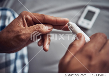 Person, hand and blood sugar with finger in home for diabetes to monitor insulin, glucometer or test. Medical, pen and safety or health measure as genetic problem or bad diet, wellness or diagnostic Person, hand and blood sugar with finger in home for diabetes to monitor insulin, glucometer or test. Medical, pen and safety or health measure as genetic problem or bad diet, wellness or diagnostic 142145062