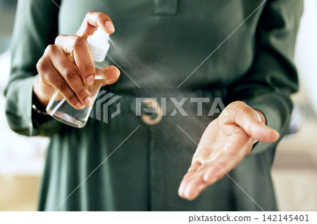 Business person and hands with spray bottle or sanitiser to clean virus and bacteria for safe workplace. Health, compliance and woman in closeup with disinfectant for hygiene and germ protection Business person and hands with spray bottle or sanitiser to clean virus and bacteria for safe workplace. Health, compliance and woman in closeup with disinfectant for hygiene and germ protection 142145401