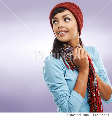Fashion, woman and thinking in winter, beanie with scarf for warm on studio background. Accessories, clothing and capsule wardrobe with style for cold weather, hat and thrift for happy female model Fashion, woman and thinking in winter, beanie with scarf for warm on studio background. Accessories, clothing and capsule wardrobe with style for cold weather, hat and thrift for happy female model 142145541